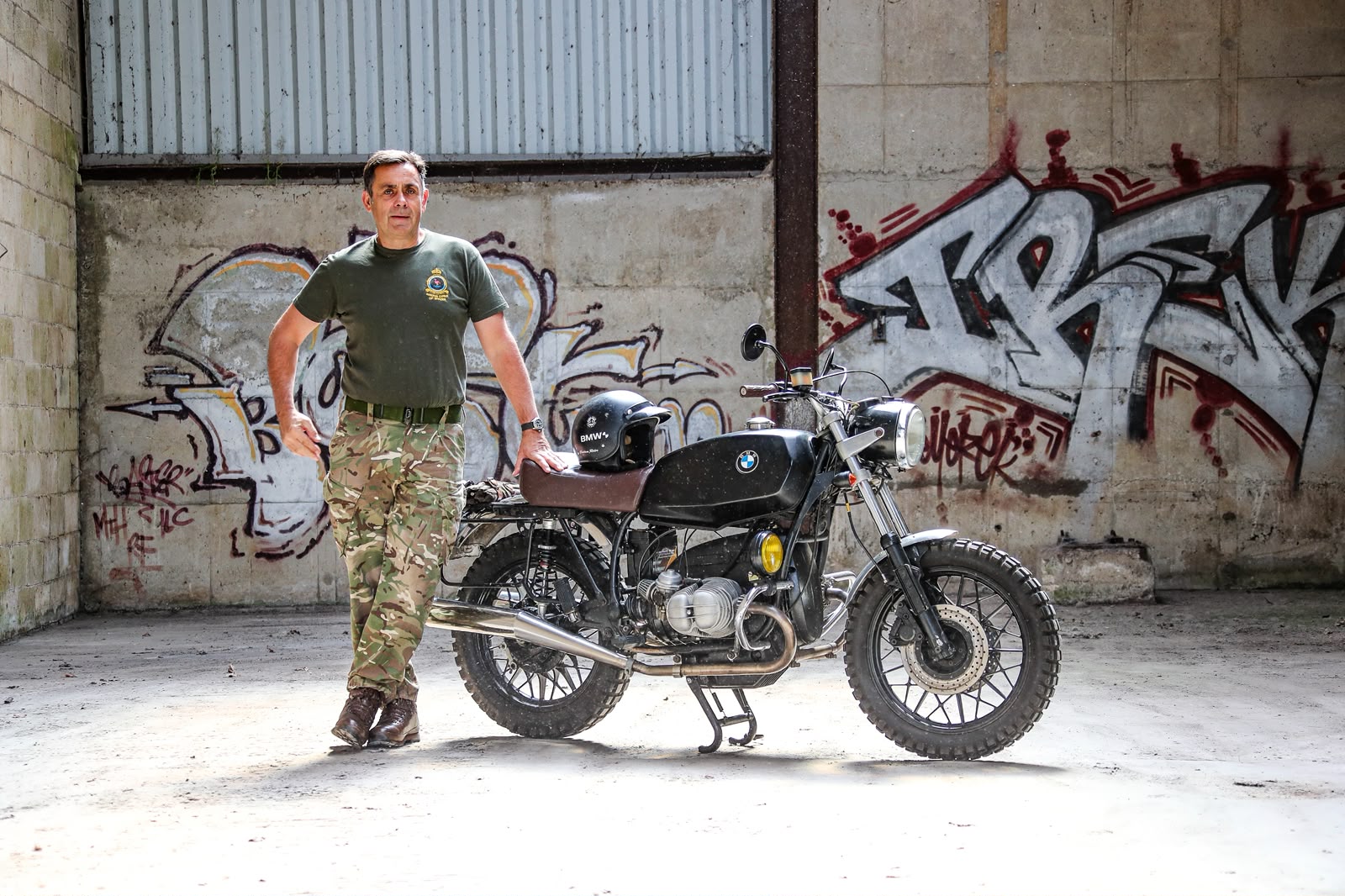 Johnnie Spitfire with his BMW R45 in the workshop